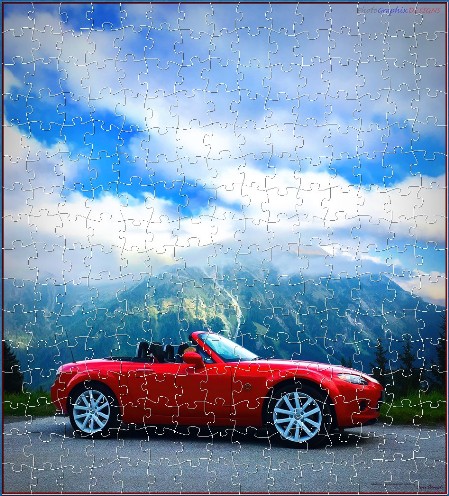 BUY NOW! DRIVEN BY PASSION: A TRUE RED IN THE AUSTRIAN ALPS - web-playable jigsaw